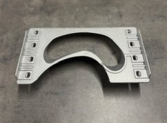 Usměrnovač materiálu