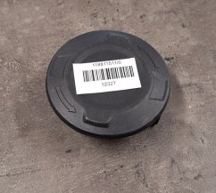 Víčko strunové hlavy